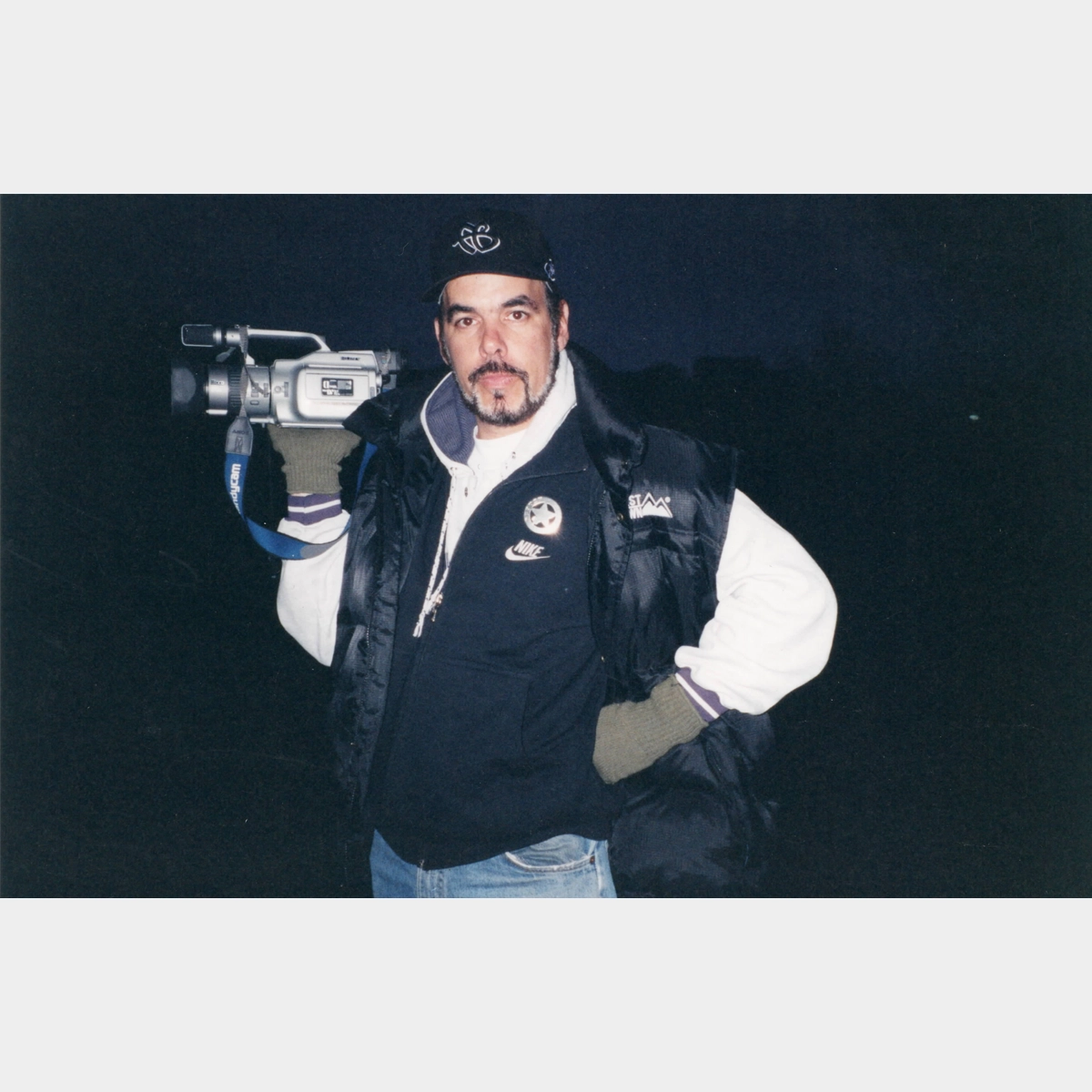 frank Borres holding camera